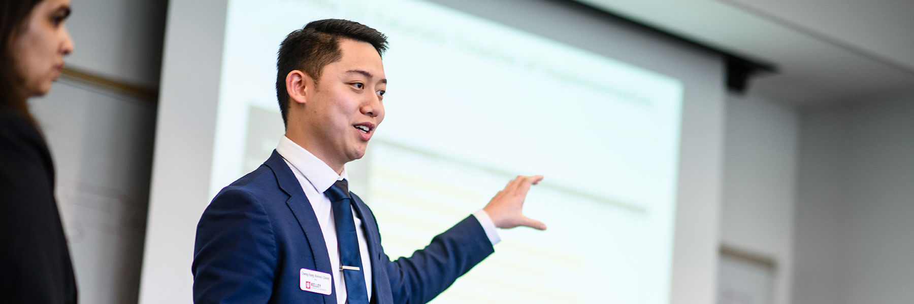 A Kelley student gives a Core Project presentation in the MS in information systems program.
